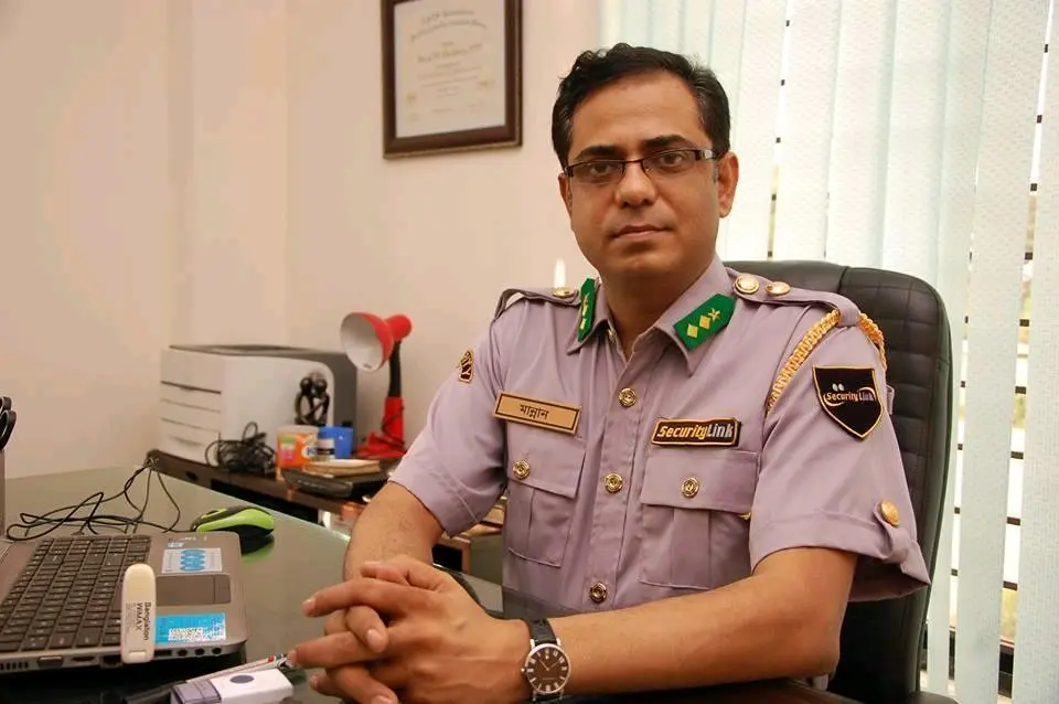 Major (Retd.) Md. Nurul Mannan Choudhury, CPP, MBA (HRM), Managing Director of SecurityLink Ltd., seated at his office desk