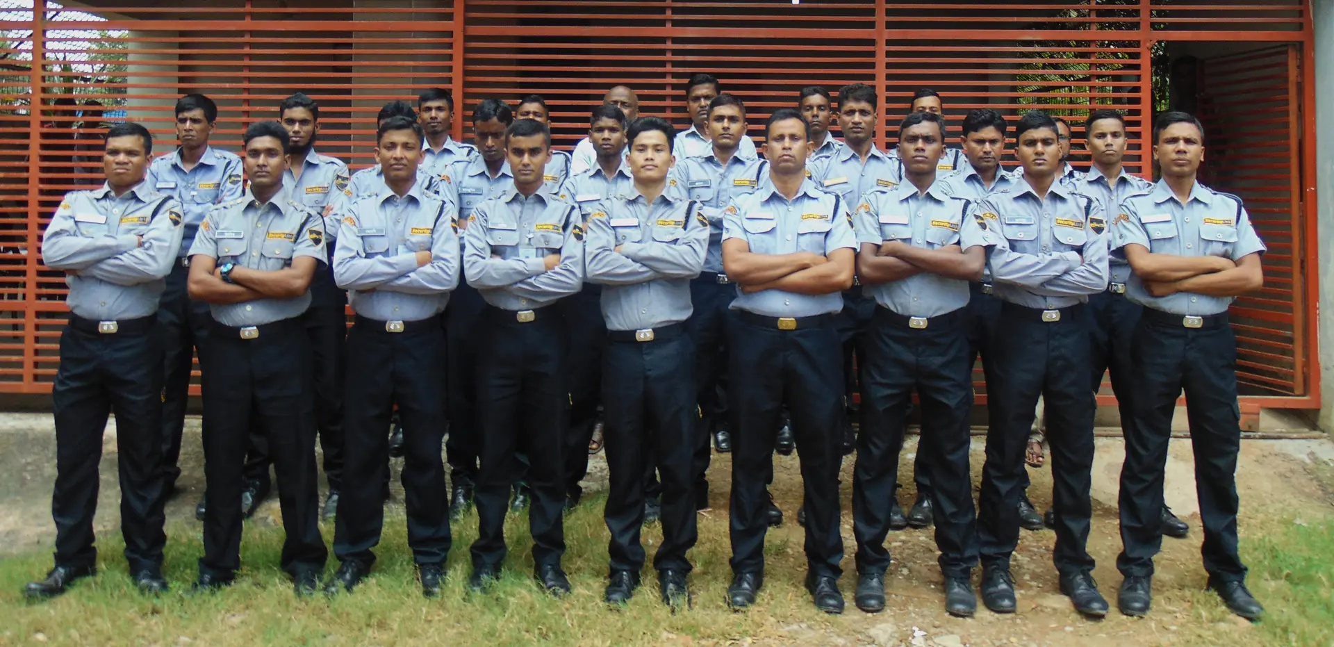 SecurityLink guard team in professional formation during inspection